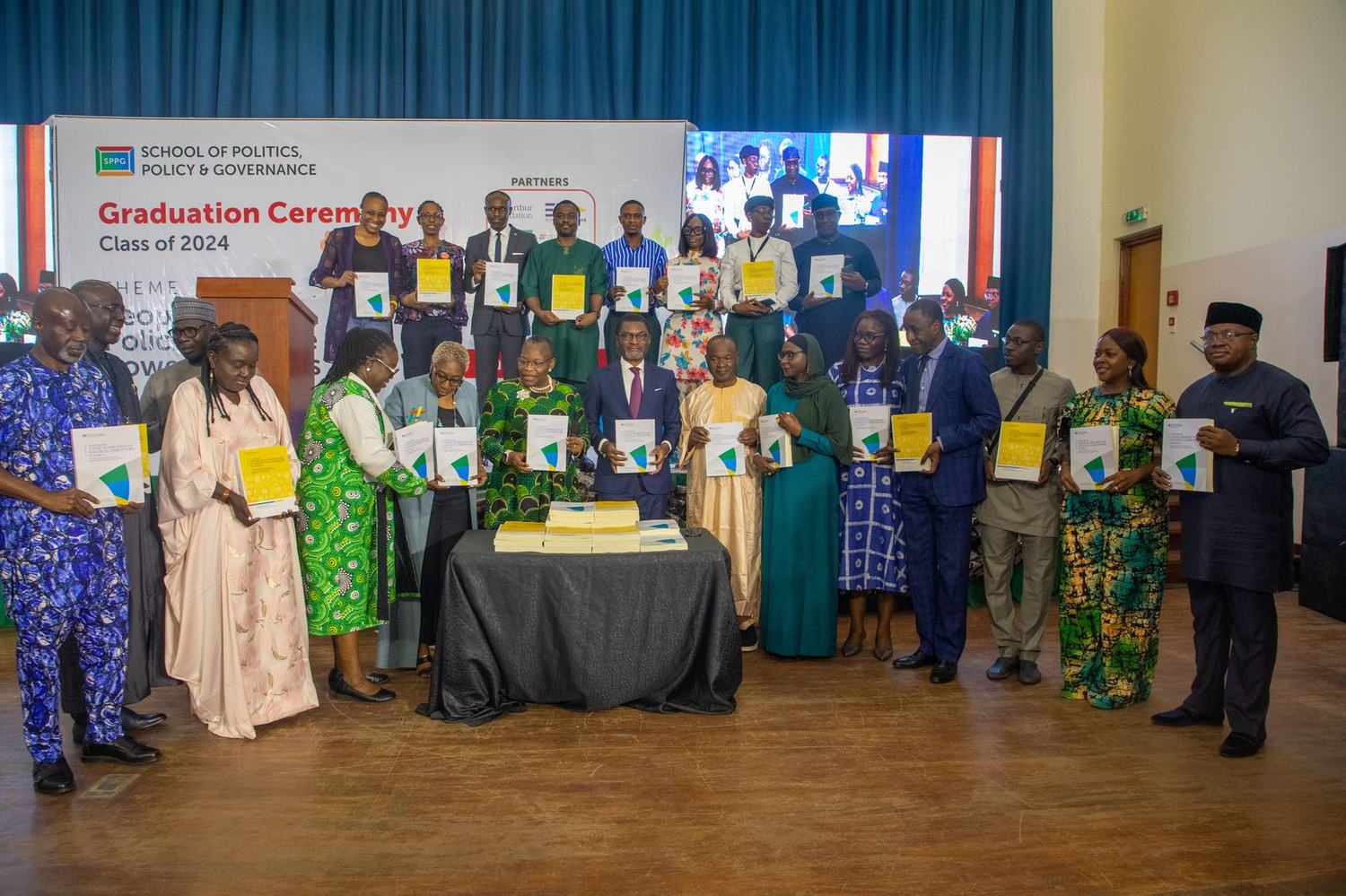 An SPPG graduating class with their certificates